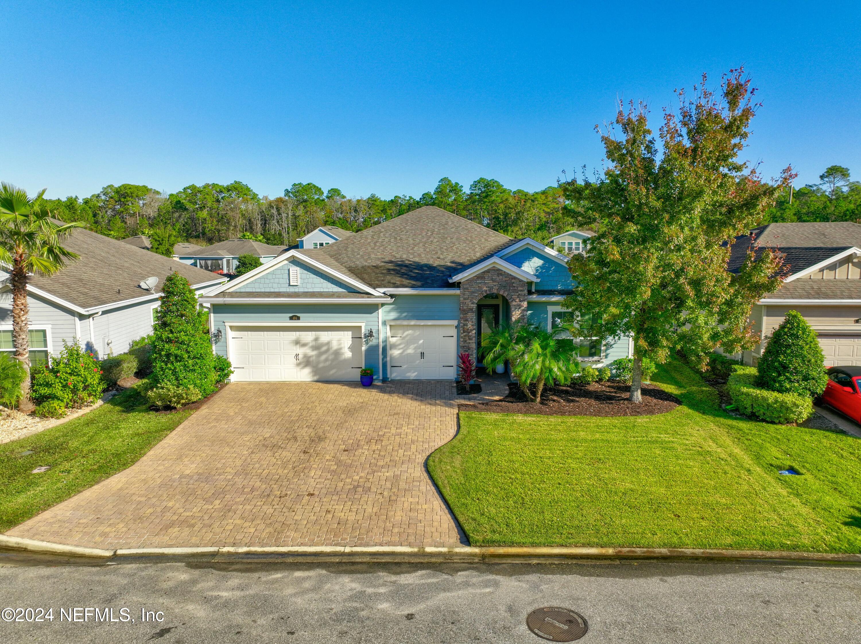 404 St Kitts Loop St. Augustine, FL 32092 - Photo 47 of 68 front view of house with a yard
