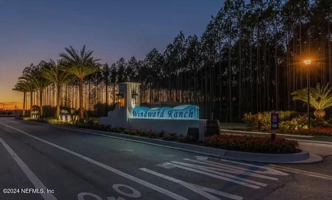 404 St Kitts Loop St. Augustine, FL 32092 - Photo 66 of 68 a sign that is sitting on the side of a road