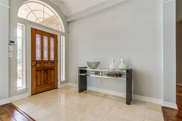 a kitchen with stainless steel appliances granite countertop a stove and a refrigerator