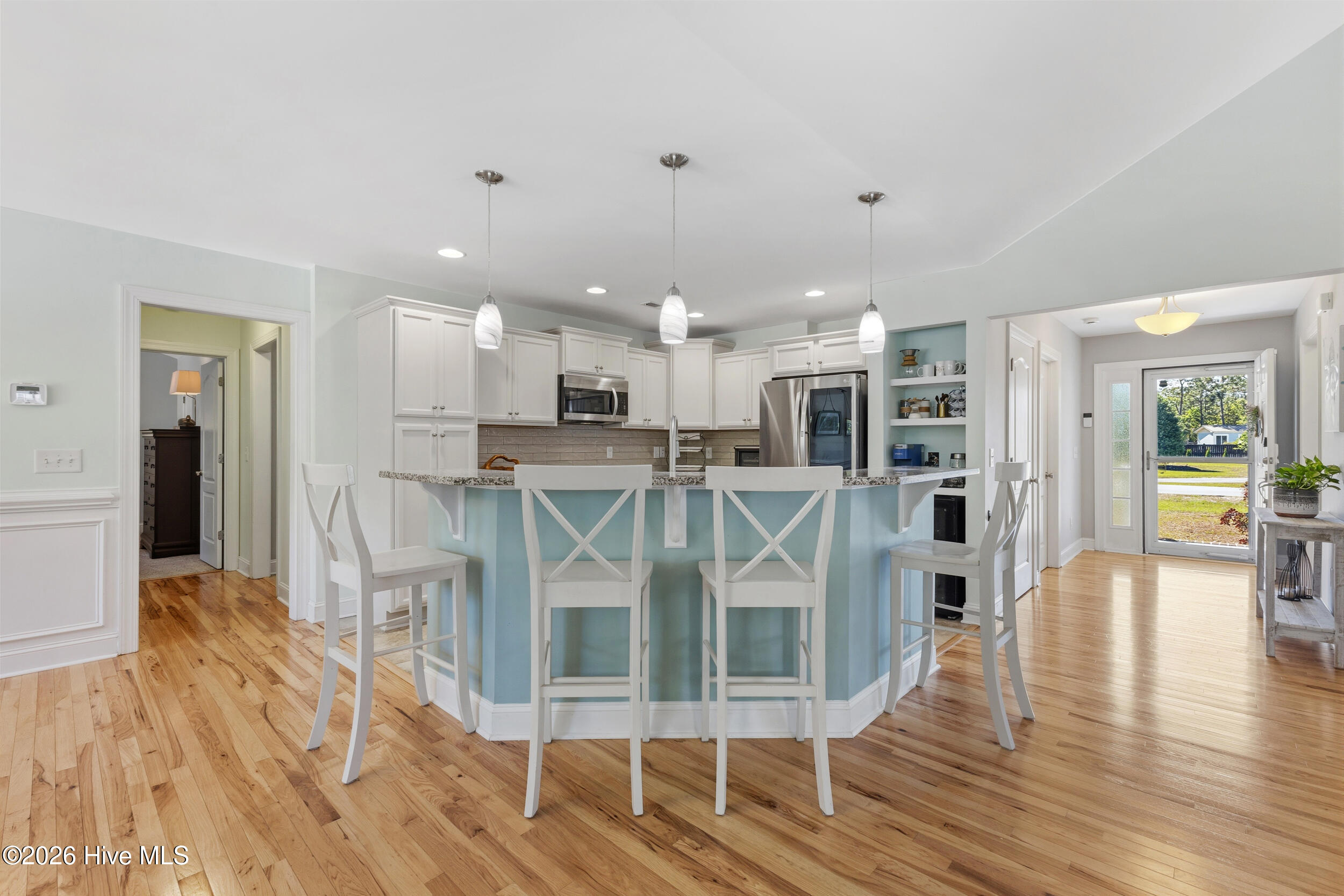 2030 Gastonia Road Southport, NC 28461 - Photo 12 of 89 Kitchen island with seating