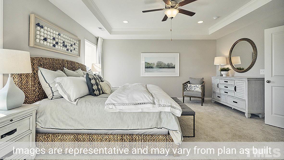 5037 Chase Hill Way Raleigh, NC 27603 - Photo 31 of 41 a living room with furniture and a window