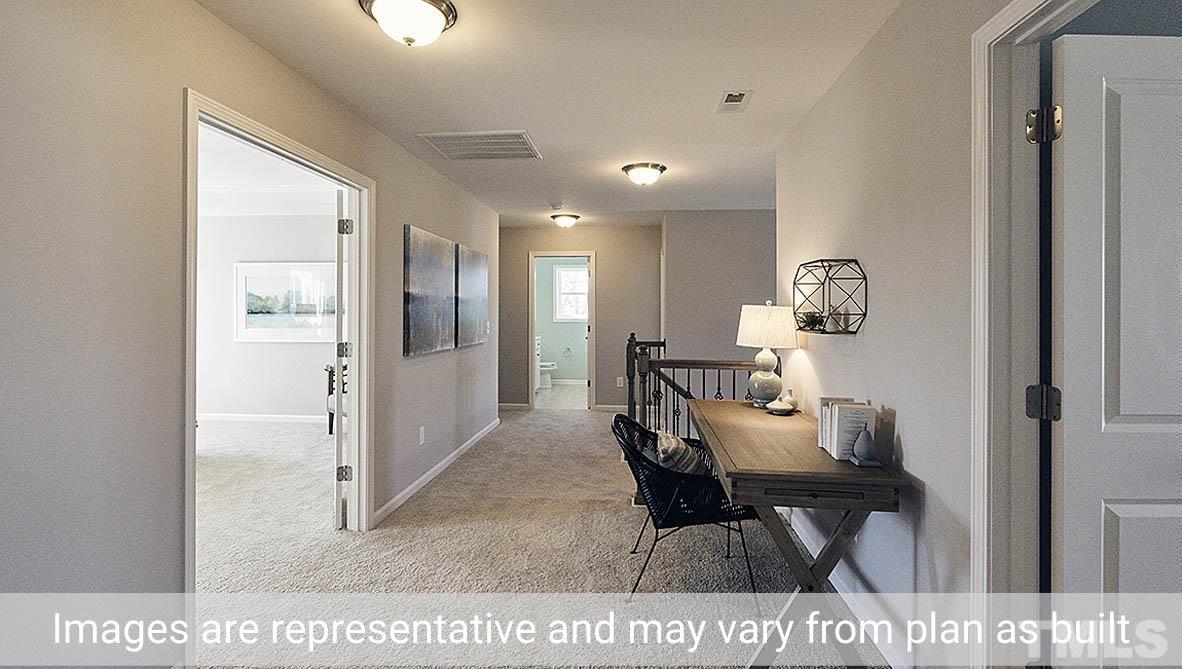 5037 Chase Hill Way Raleigh, NC 27603 - Photo 39 of 41 a view of a dining room with furniture