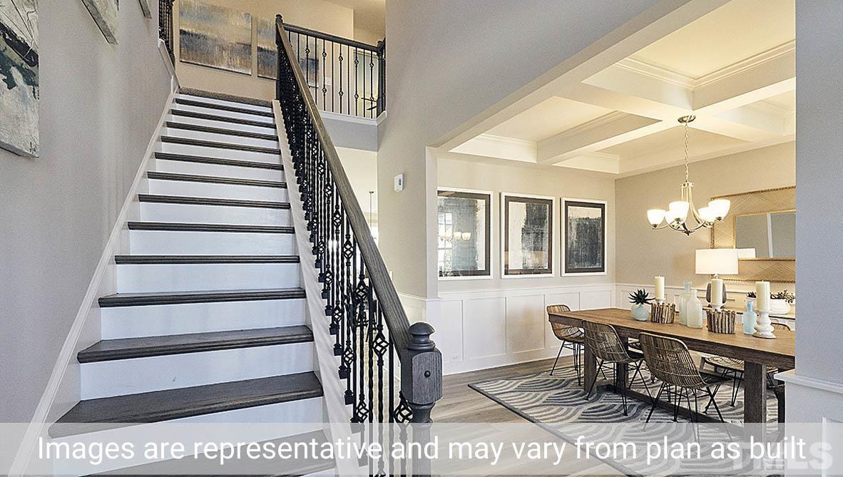5037 Chase Hill Way Raleigh, NC 27603 - Photo 7 of 41 a view of entryway and hall with wooden floor