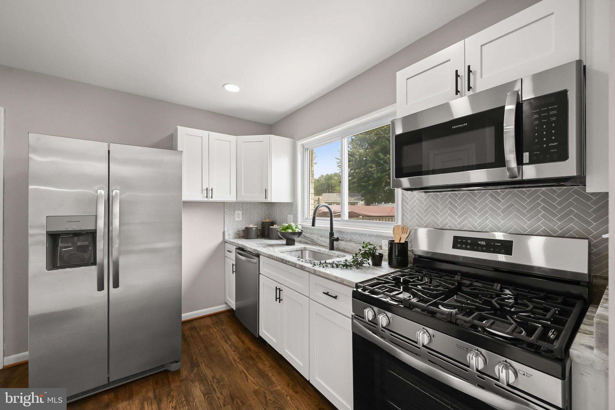 6035 Moorehead Road Baltimore, MD 21228 - Photo 3 of 43 Renovated kitchen