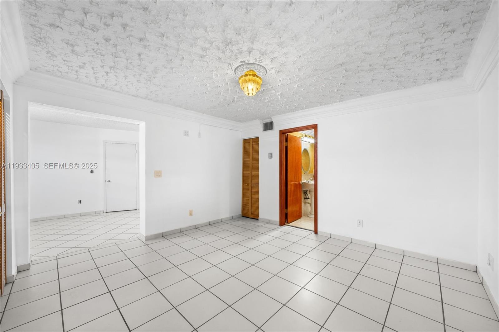 11620 Southwest 179th Terrace Miami, FL 33157 - Photo 20 of 25 a view of an empty room and window