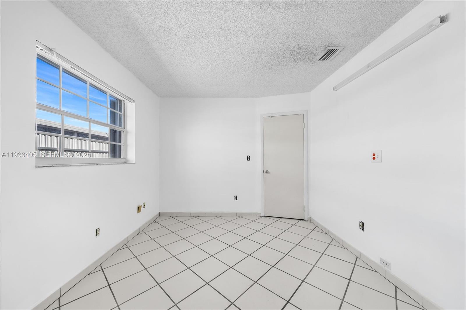 11620 Southwest 179th Terrace Miami, FL 33157 - Photo 21 of 25 a view of an empty room
