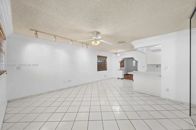 a view of a storage & utility room with cabinets