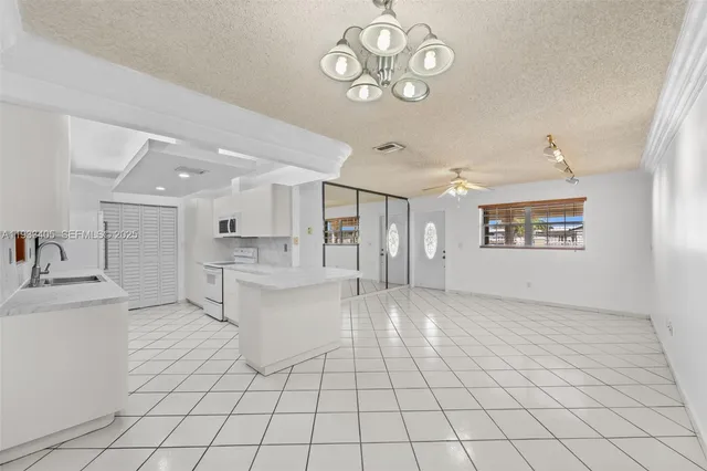 a view of kitchen and windows