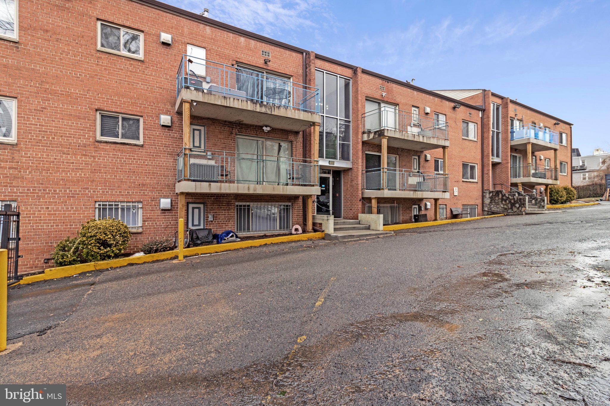 2608 Wade Road Southeast, Unit 202 Washington, DC 20020 - Photo 23 of 25 a view of a building with a street