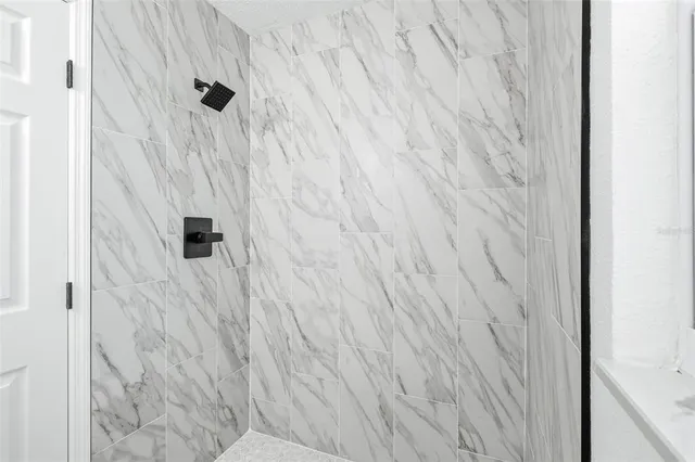 a bathroom with a sink a mirror and a toilet