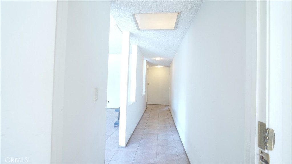 20522 Seton Hill Drive Walnut, CA 91789 - Photo 19 of 51 a view of a hallway with wooden floor