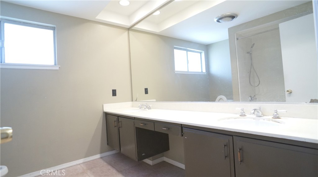 20522 Seton Hill Drive Walnut, CA 91789 - Photo 27 of 51 a bathroom with a sink and a mirror