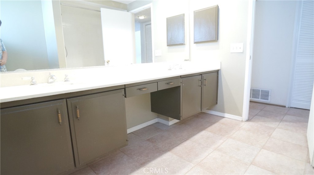 20522 Seton Hill Drive Walnut, CA 91789 - Photo 28 of 51 a bathroom with a sink and a mirror
