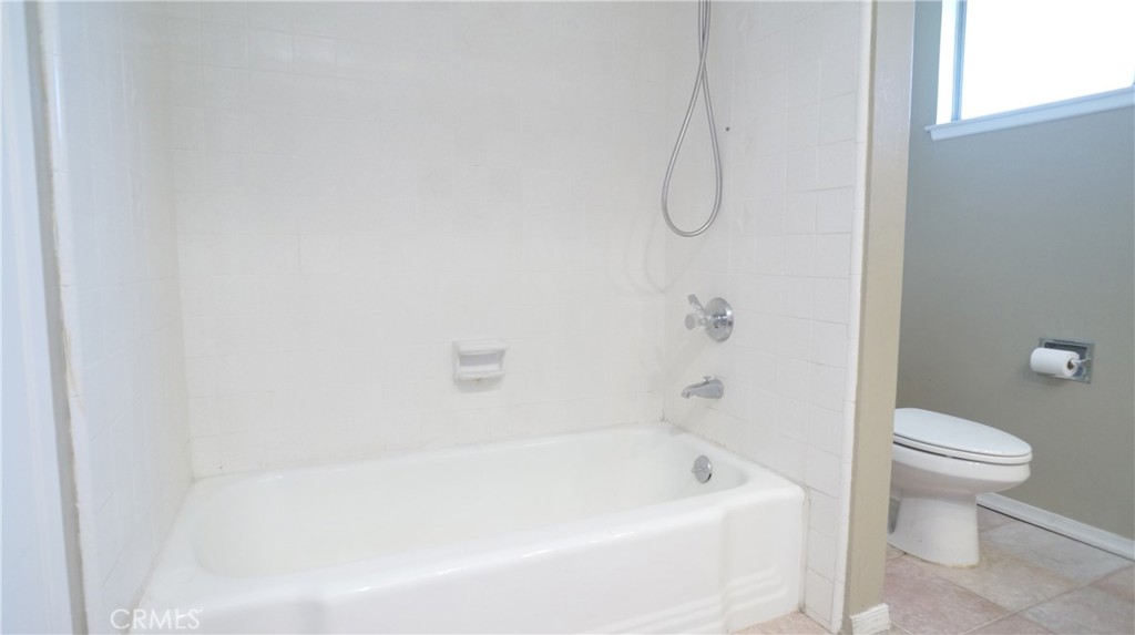 20522 Seton Hill Drive Walnut, CA 91789 - Photo 29 of 51 a bathroom with a bathtub and a toilet