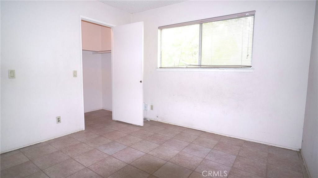 20522 Seton Hill Drive Walnut, CA 91789 - Photo 30 of 51 an empty room with a window