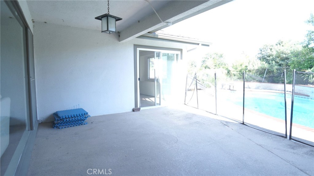 20522 Seton Hill Drive Walnut, CA 91789 - Photo 35 of 51 a view of empty room with floor to ceiling window