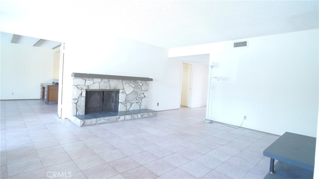 20522 Seton Hill Drive Walnut, CA 91789 - Photo 6 of 51 an empty room with a fireplace