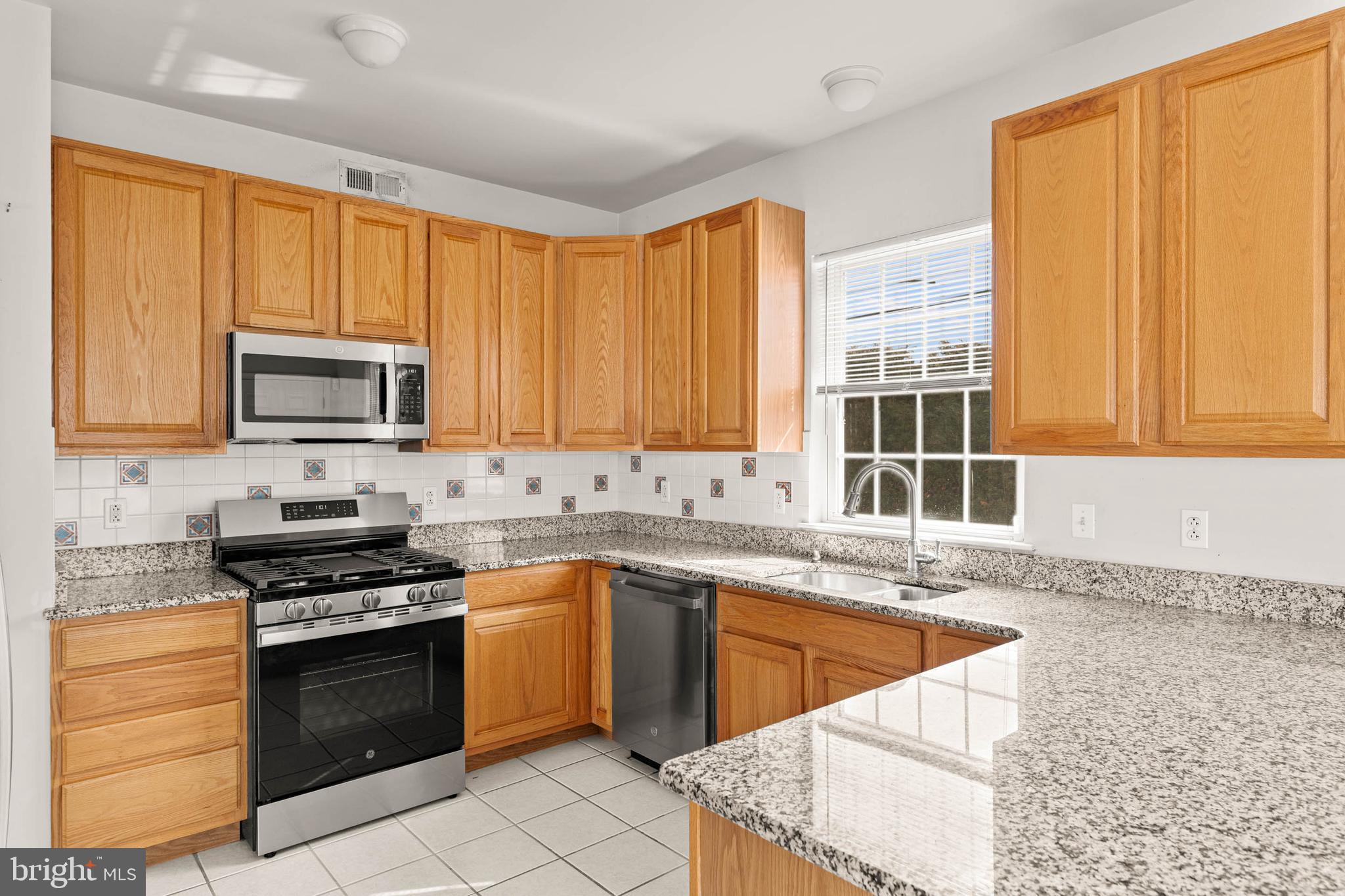 2136 Murray Street Philadelphia, PA 19115 - Photo 12 of 38 Kitchen with *NEW* stove, microwave & dishwasher