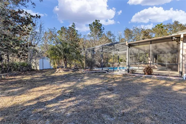 a view of a road with a building in the background