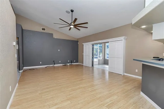 a view of a bedroom from a hallway