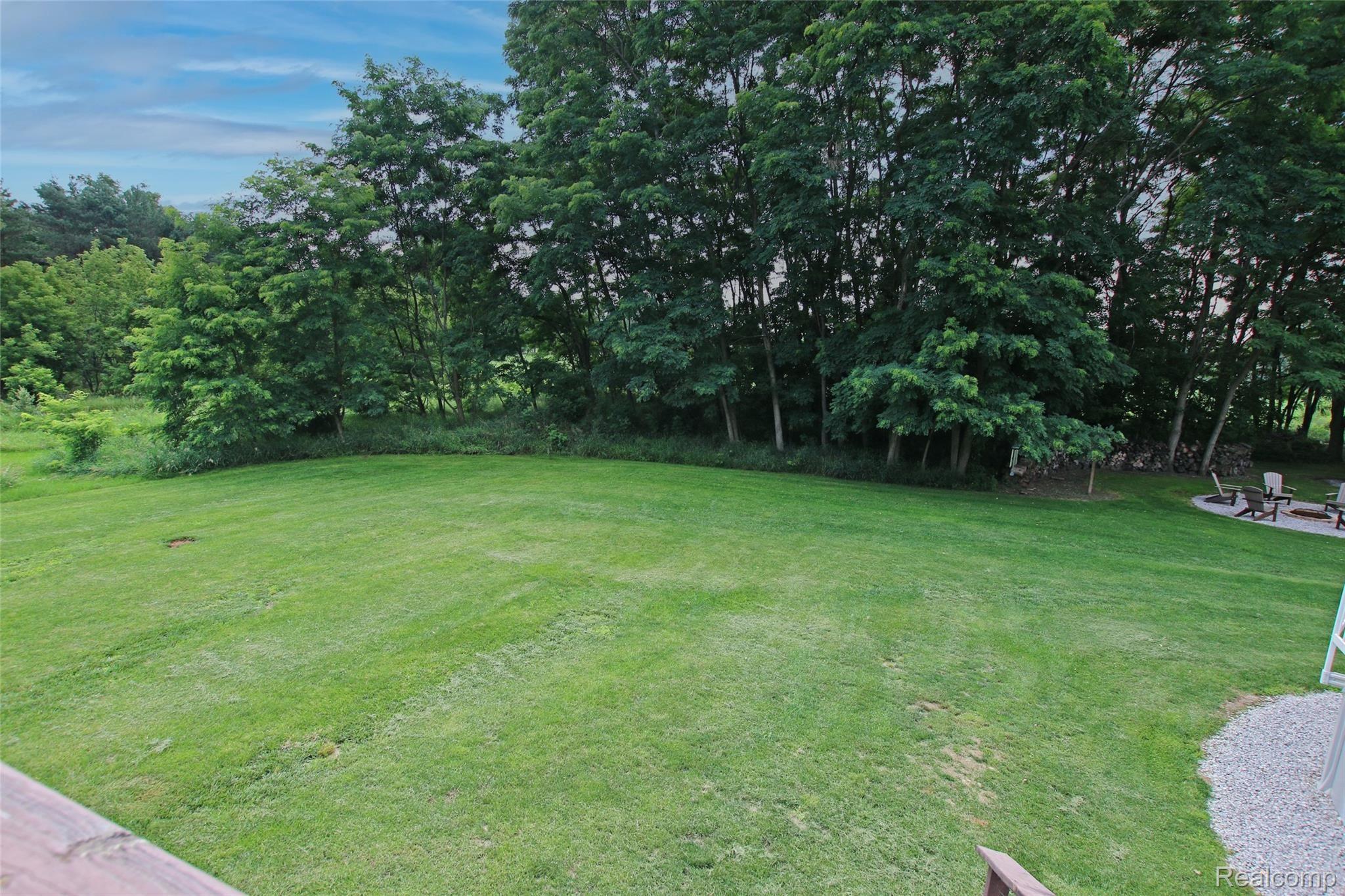4223 Merwin Road Lapeer, MI 48446 - Photo 74 of 83 73) Back Deck View.jpg