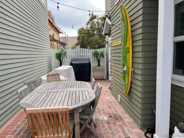 a view of balcony with wooden floor