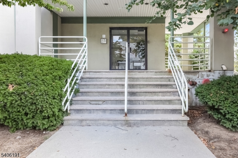850 Main Street, Unit 3F Hackensack, NJ 07601 - Photo 2 of 11 a view of a house with entryway and windows