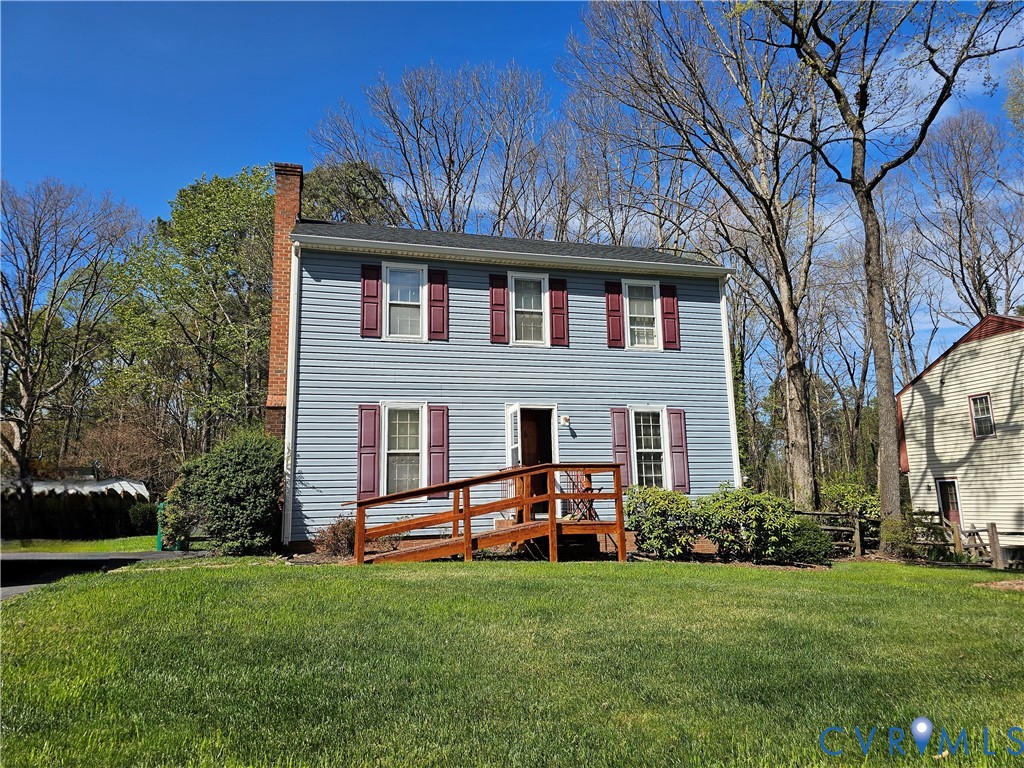 8996 Tameo Road Glen Allen, VA 23060 - Photo 1 of 45 a front view of house with yard and green space