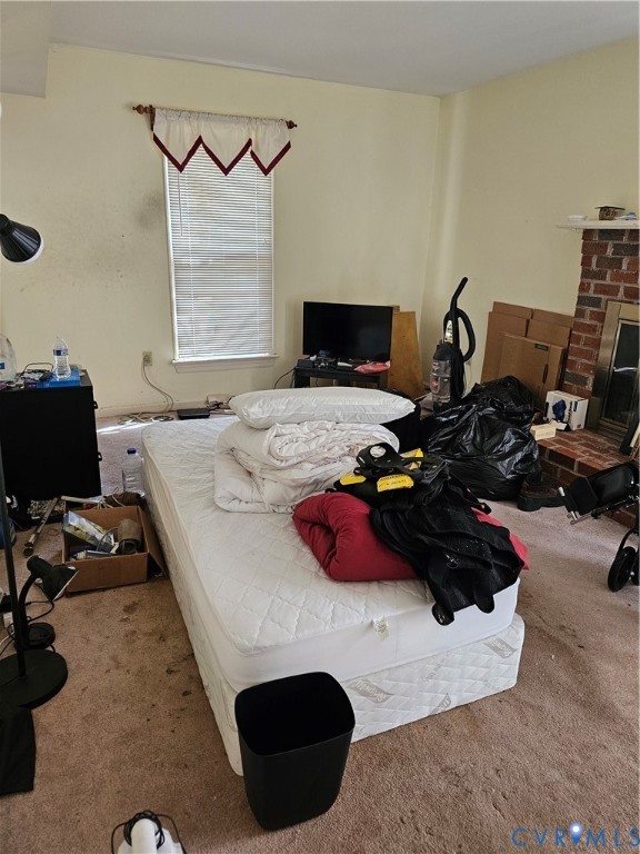 8996 Tameo Road Glen Allen, VA 23060 - Photo 29 of 45 a bedroom with a bed and a window