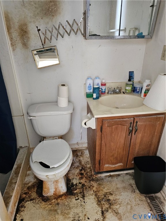 8996 Tameo Road Glen Allen, VA 23060 - Photo 35 of 45 a bathroom with a toilet and a mirror