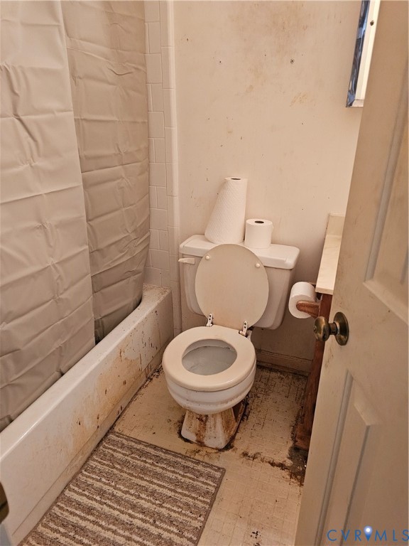 8996 Tameo Road Glen Allen, VA 23060 - Photo 37 of 45 a white toilet sitting next to a shower