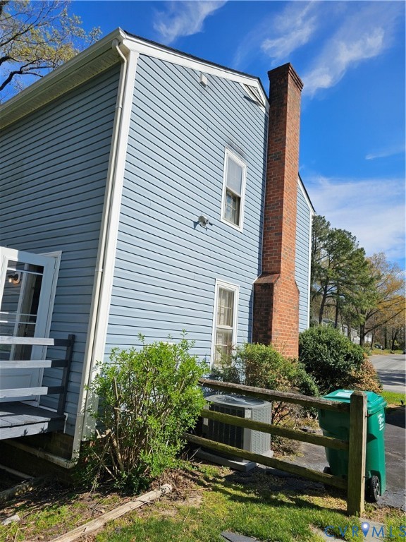 8996 Tameo Road Glen Allen, VA 23060 - Photo 5 of 45 a front view of house with yard
