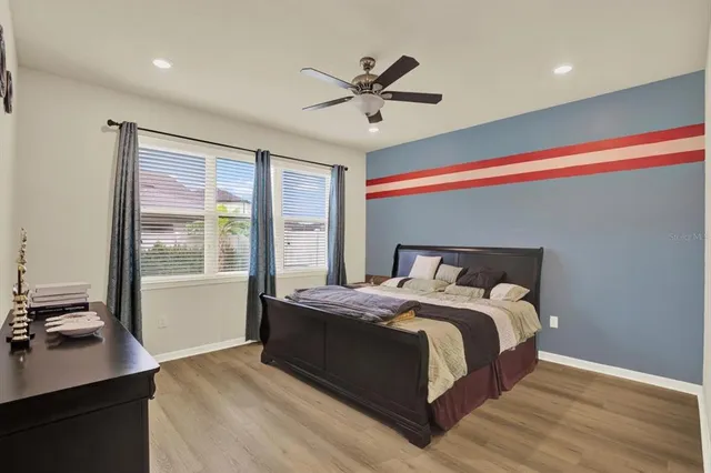 a bed room with a bed and a window