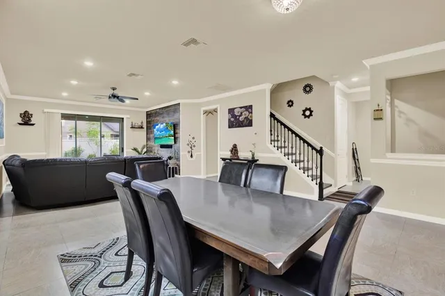 a view of a dining room with furniture