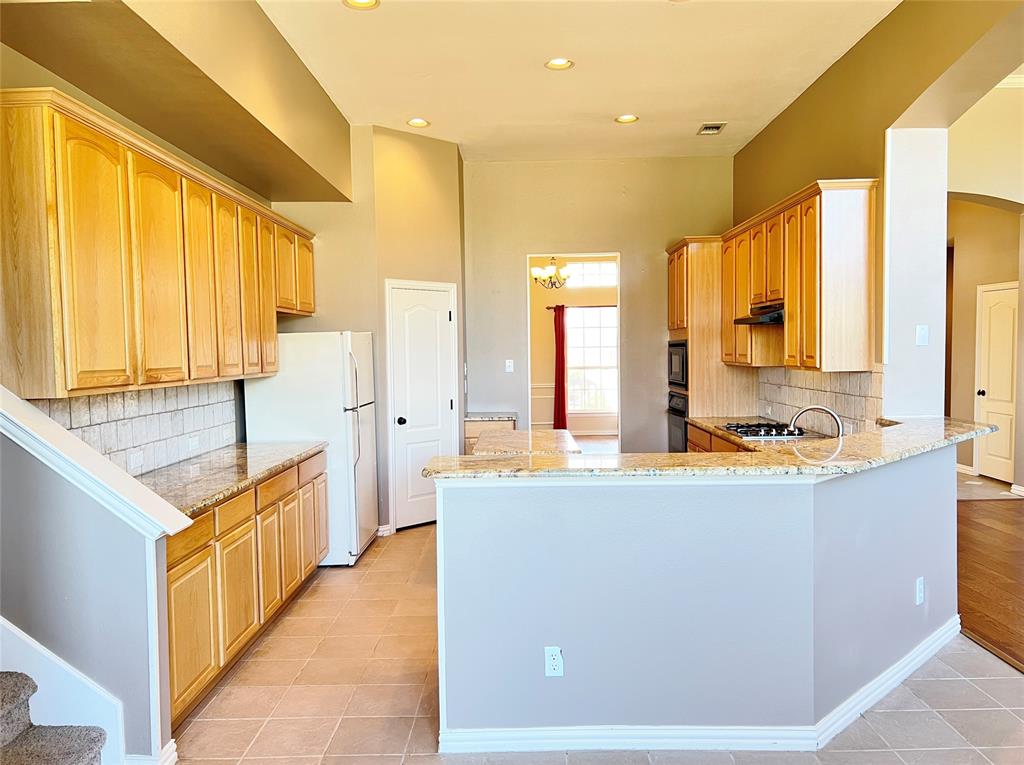 7517 Rodeo Drive Denton, TX 76208 - Photo 11 of 30 a large bathroom with a large tub and sink