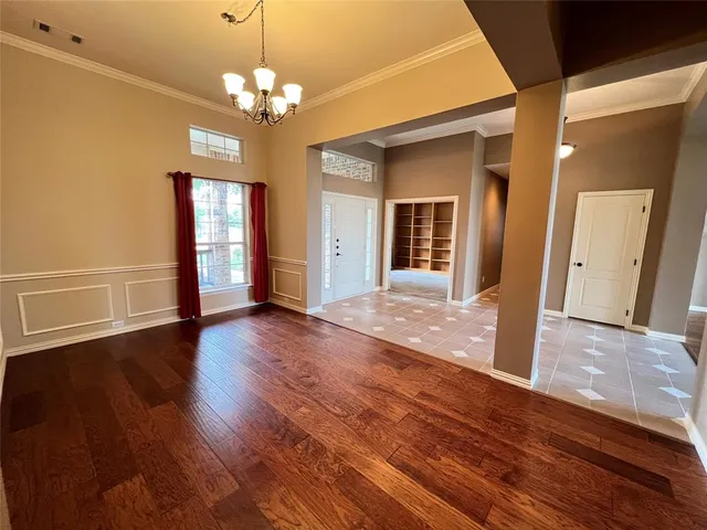 a view of a livingroom with wooden floor