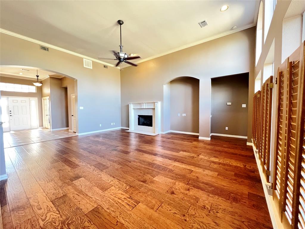 7517 Rodeo Drive Denton, TX 76208 - Photo 8 of 30 a view of a livingroom with a fireplace