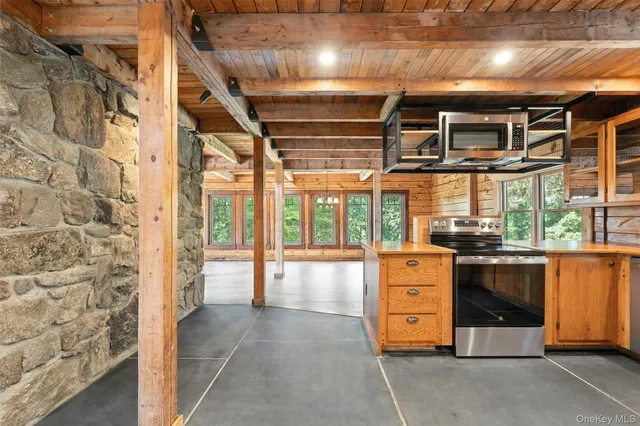 a view of an entryway with kitchen