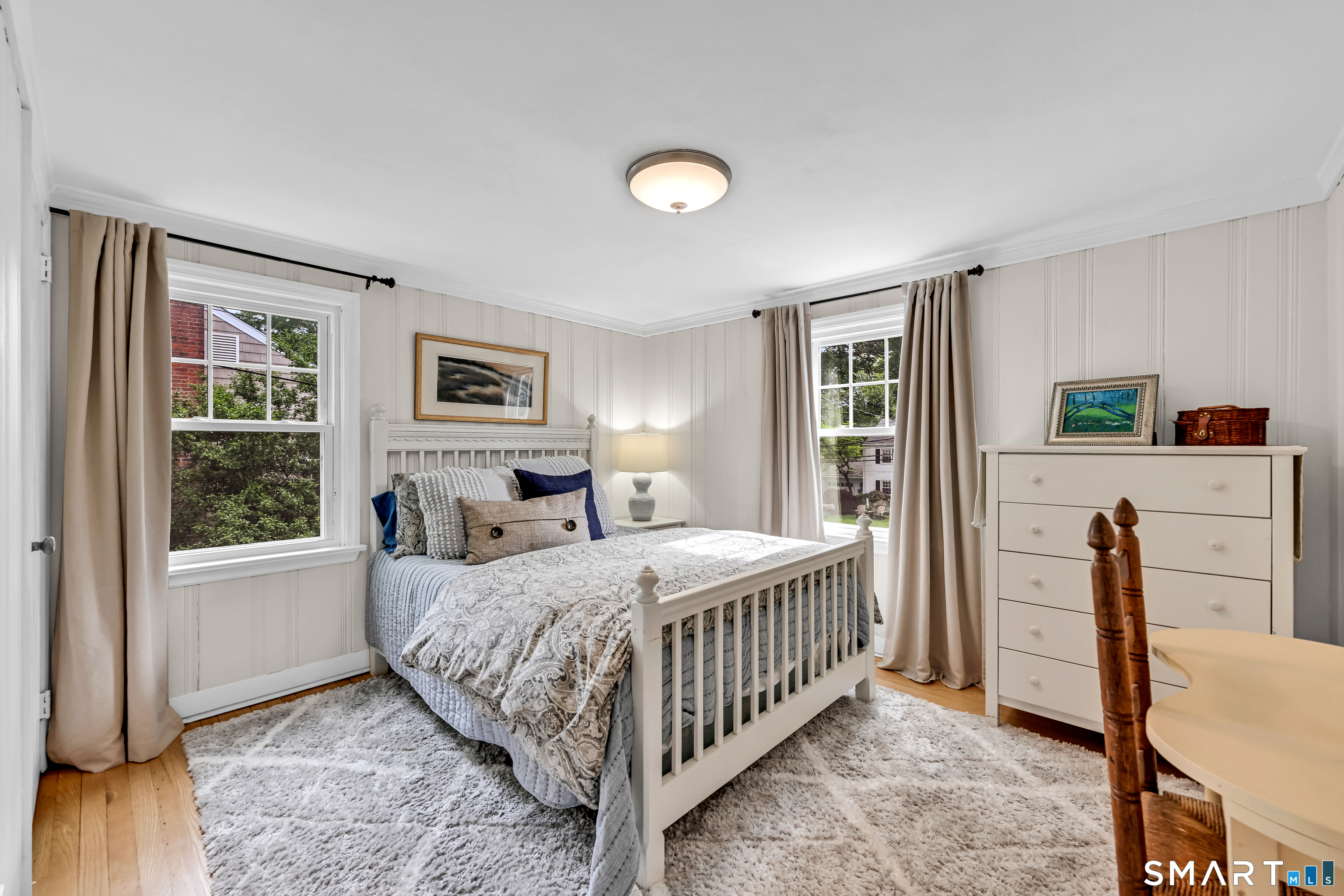 47 Spring Lane West Hartford, CT 06107 - Photo 20 of 38 a bedroom with a bed next to a window with the outer view