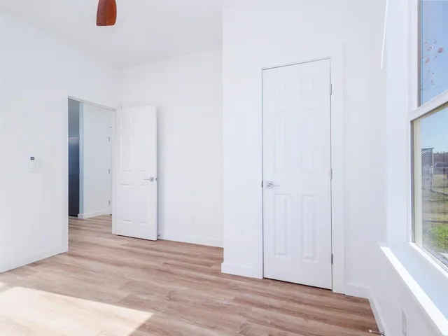 a view of entryway with wooden floor