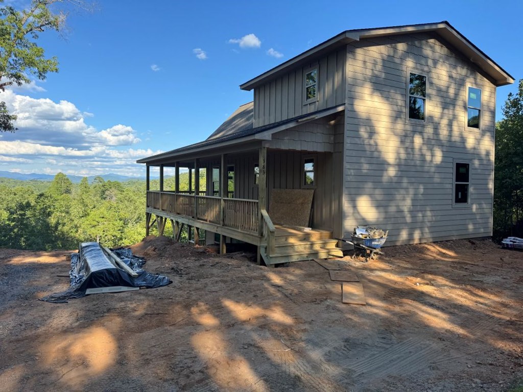 383 Point Overlook Trail Murphy, NC 28906 - Photo 3 of 6 a view of a house with wooden fence