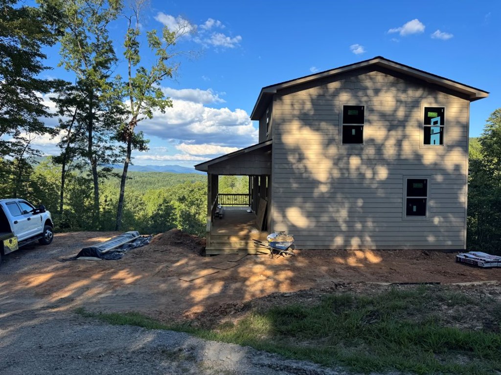 383 Point Overlook Trail Murphy, NC 28906 - Photo 4 of 6 a front view of a house with a yard