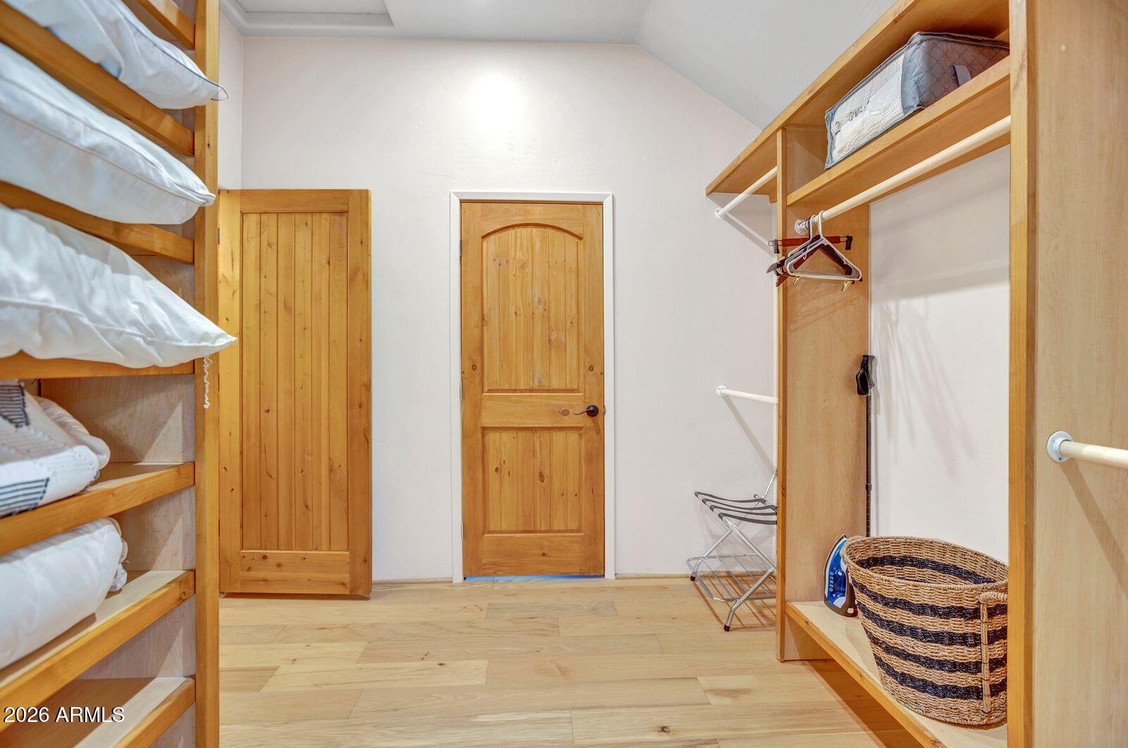 55 Ranch House Circle Sedona, AZ 86336 - Photo 38 of 61 a view of a room with wooden floor and door