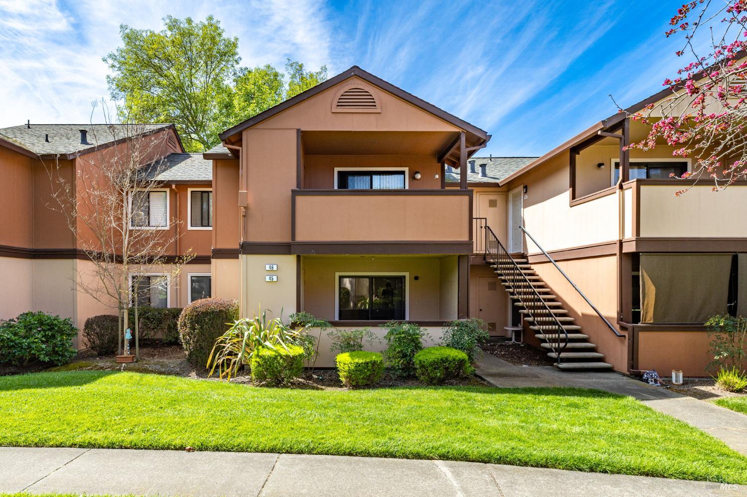 8201 Camino Colegio, Unit 45 Rohnert Park, CA 94928 - Photo 1 of 1 a front view of a house with a yard