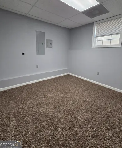 a view of a livingroom with wooden floor