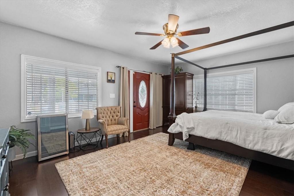 3974 5th Street Riverside, CA 92501 - Photo 20 of 45 a bed room with a bed and a chair