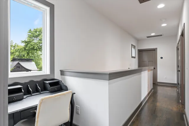 a room with furniture and a window