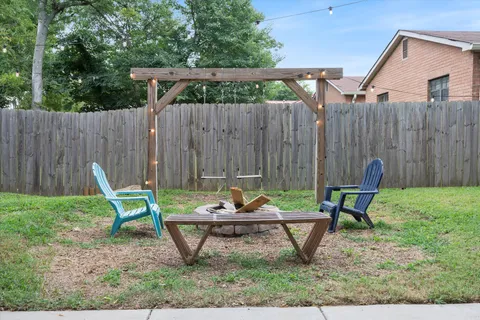 a garden view with a seating space