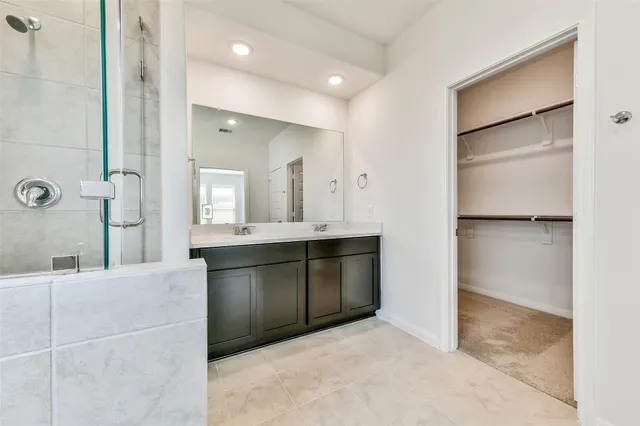 a view of an empty room with a closet