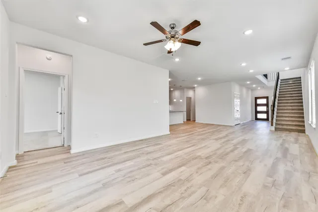 a bathroom with a double vanity sink and mirror